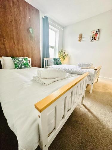 Ένα ή περισσότερα κρεβάτια σε δωμάτιο στο Central location to brayford wharf, FREE PARKING, walkable to lincoln city