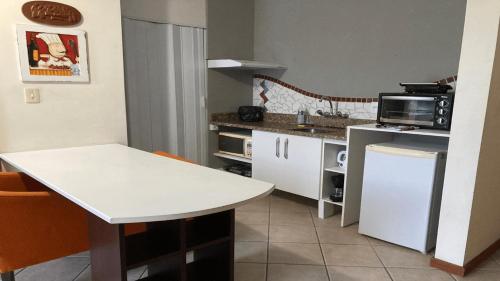 Dapur atau dapur kecil di Saint Sebastian Flat 614 - Com Hidro! até 3 pessoas, Duplex, no centro