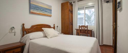 Кровать или кровати в номере Hotel las Salinas