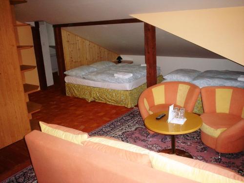 Postel nebo postele na pokoji v ubytování Pension Schaumannův Dvůr
