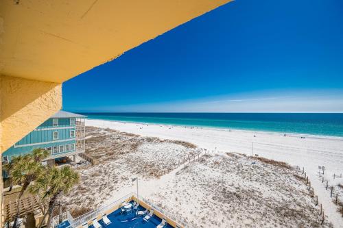 an overhead view of a beach with a building and the ocean at Driftwood Towers 5E in Gulf Shores