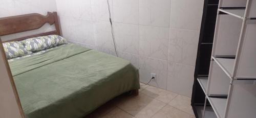 Postel nebo postele na pokoji v ubytování Residencial Barbosa 103