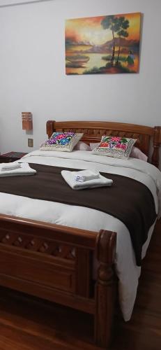 two beds sitting next to each other in a room at Puerto Yumani in Comunidad Yumani