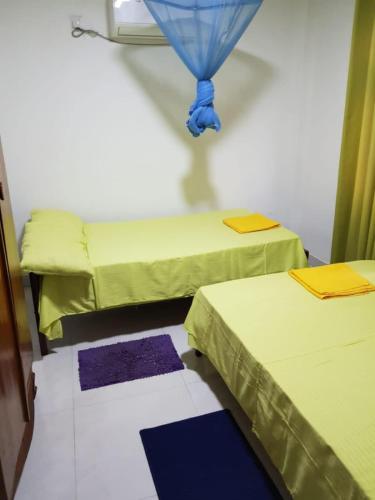 Bopitiya Residence 20 Mins from Airportにあるベッド