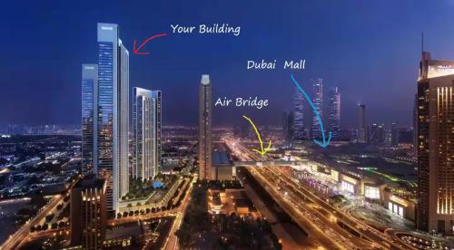 a view of a city at night with buildings at Fresh New 2 Bedroom! Amazing Burj Khalifa View! 5-star Pool & Gym Access! in Dubai