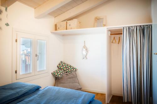 Кровать или кровати в номере Casa Bellucci