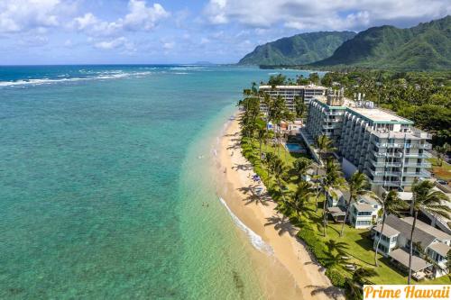 an aerial view of the beach and the ocean at Ground Level Beachfront Studio in Hauula