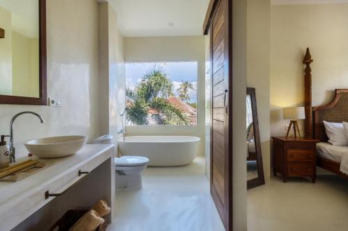 Ένα μπάνιο στο White Goose Boutique Hotel