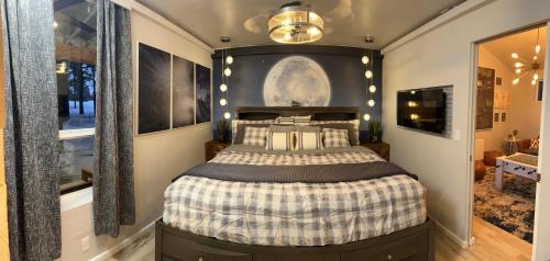 a bedroom with a large bed in a room at McCall Art House in McCall