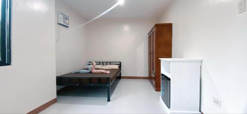 Postel nebo postele na pokoji v ubytování Paradise Guesthouse
