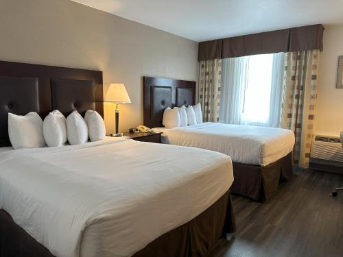Katil atau katil-katil dalam bilik di Quality Inn & Suites Everett