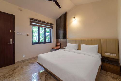 Postel nebo postele na pokoji v ubytování Palette - Coastal Grand Hotels & Resorts, OMR
