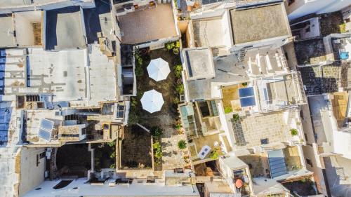 an aerial view of a city with buildings at Palazzo Insula in Gallipoli