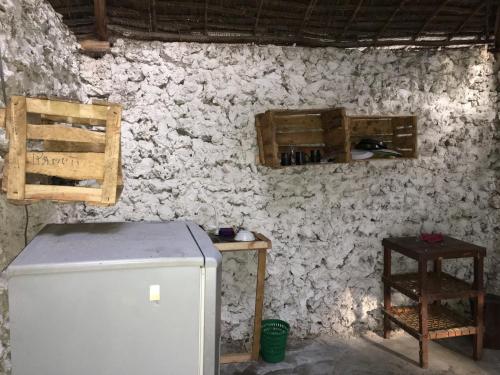 Η κουζίνα ή μικρή κουζίνα στο Barefeet Bungalow