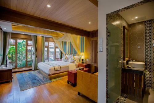 Postelja oz. postelje v sobi nastanitve Lijiang Hearing Flower Hall Garden Inn Butterfly Language Shop