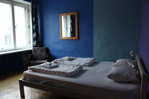 Postel nebo postele na pokoji v ubytování Viru Backpackers Hostel
