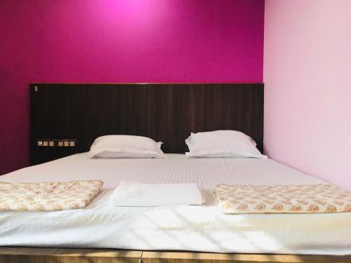 Katil atau katil-katil dalam bilik di Chanda Palace Guest House