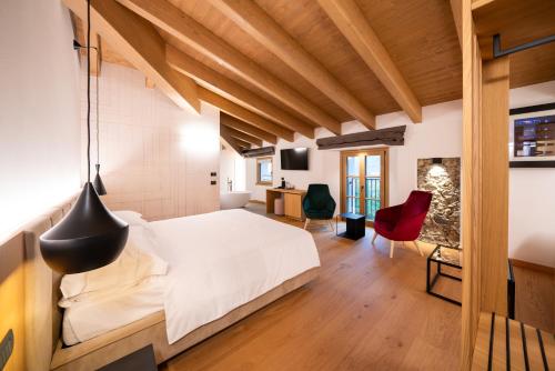 TV a/nebo společenská místnost v ubytování Wine Hotel Ristorante San Carlo - Boutique Hotel & SPA