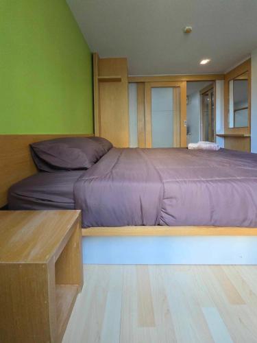 Postel nebo postele na pokoji v ubytování The Feeltrue phuket ck