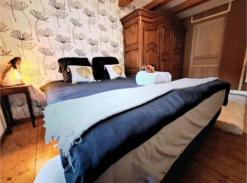 Postel nebo postele na pokoji v ubytování Gîte Spa "La Foret Argentée" proche Gérardmer