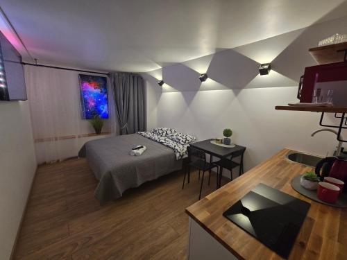 Postel nebo postele na pokoji v ubytování T5 Studio apartment