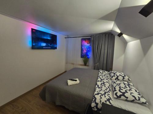 Postel nebo postele na pokoji v ubytování T5 Studio apartment
