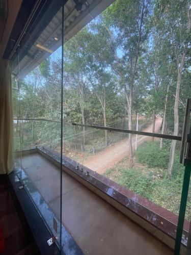 Balkón nebo terasa v ubytování Riverside Resort Yelagiri