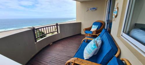 a room with a balcony with a view of the ocean at Westbrook Blue Largo 33 in Westbrook