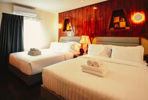 Katil atau katil-katil dalam bilik di Hotel Rue De Siam