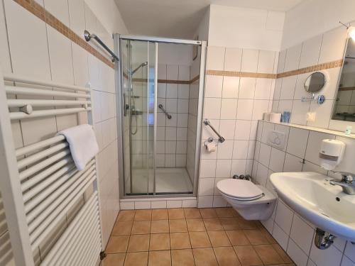 Koupelna v ubytování Zeitlos Hotel Garni
