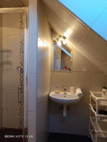 Kúpeľňa v ubytovaní Zita Apartman