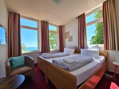 Postel nebo postele na pokoji v ubytování Zeitlos Hotel Garni