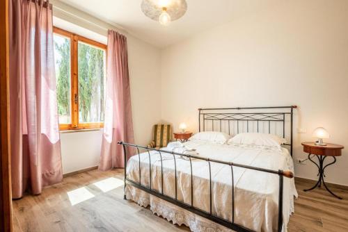 Letto o letti in una camera di Vertine Countryside