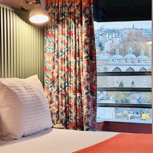 Ένα ή περισσότερα κρεβάτια σε δωμάτιο στο Casa Rosa Suites