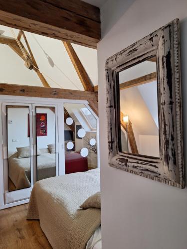 Postel nebo postele na pokoji v ubytování B&B Lange Geer Delft