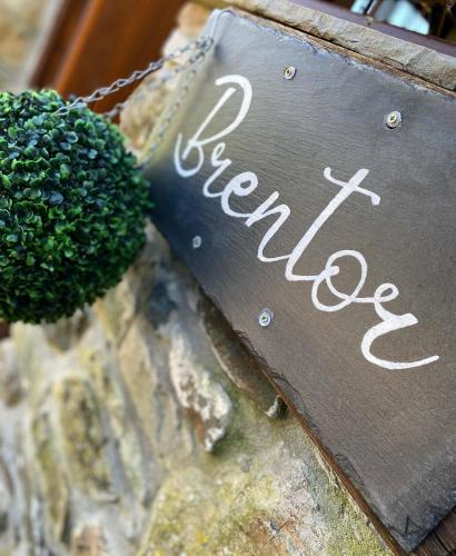 a sign with the word repair next to a piece of broccoli at The Mary Tavy Inn in Tavistock