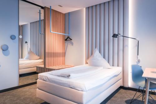 Postel nebo postele na pokoji v ubytování Art Hotel Ahlen