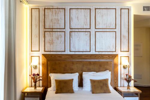 Una cama o camas en una habitación de Il Belvedere