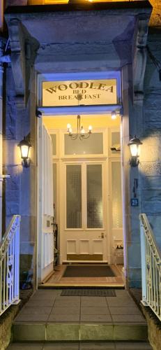 a front door of a house with two lights at Woodlea in Perth