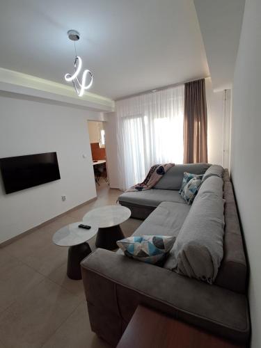 Una televisión o centro de entretenimiento en Zenit apartmani
