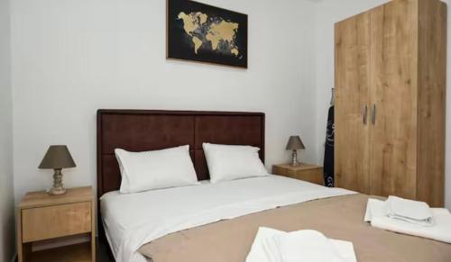 Tempat tidur dalam kamar di Portobello