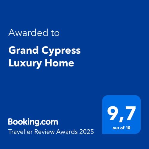 a blue screen with the text awarded to grand cypress luxury home at Grand Cypress Luxury Home in Montenegro