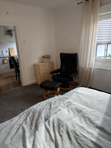 Gemütliche 2 Zimmer Wohnung in bester Lageにあるベッド