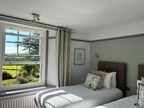 Uplands Inn Cartmelにあるベッド