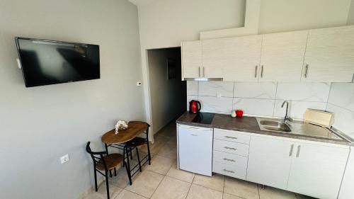 Η κουζίνα ή μικρή κουζίνα στο Loyal Apartment