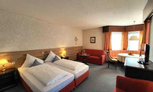 Postel nebo postele na pokoji v ubytování Hotel-Restaurant Batzenhäusl
