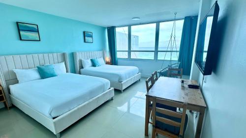 SeaStays Apartmentsにあるベッド