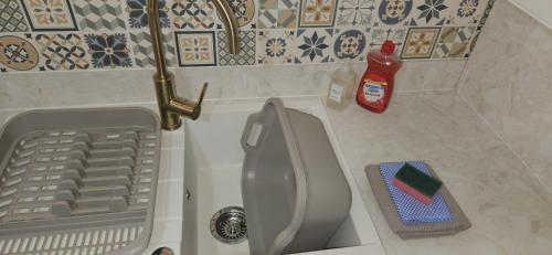 a view of a bathroom with a toilet in a room at Southbridge Studio in Fife