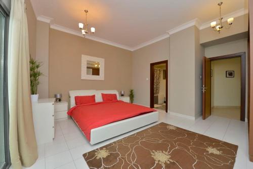 Llit o llits en una habitació de Gardenia Flats