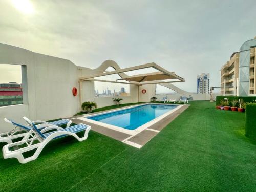 Piscina a Gardenia Flats o a prop